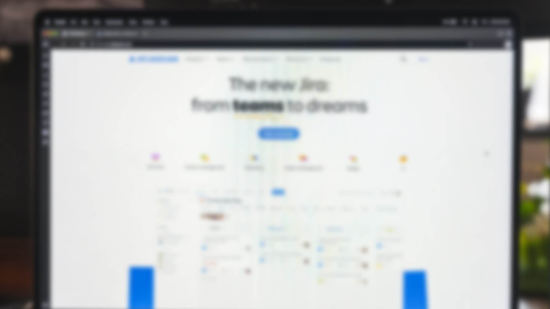 Photo of computer with Jira's website displayed